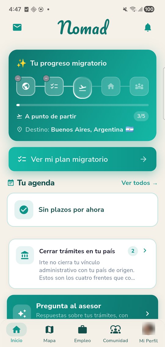 Pantalla de inicio de Nomad: la tarjeta «Tu progreso migratorio» con las cinco etapas, la etapa actual «A punto de partir» y el destino Buenos Aires, Argentina.